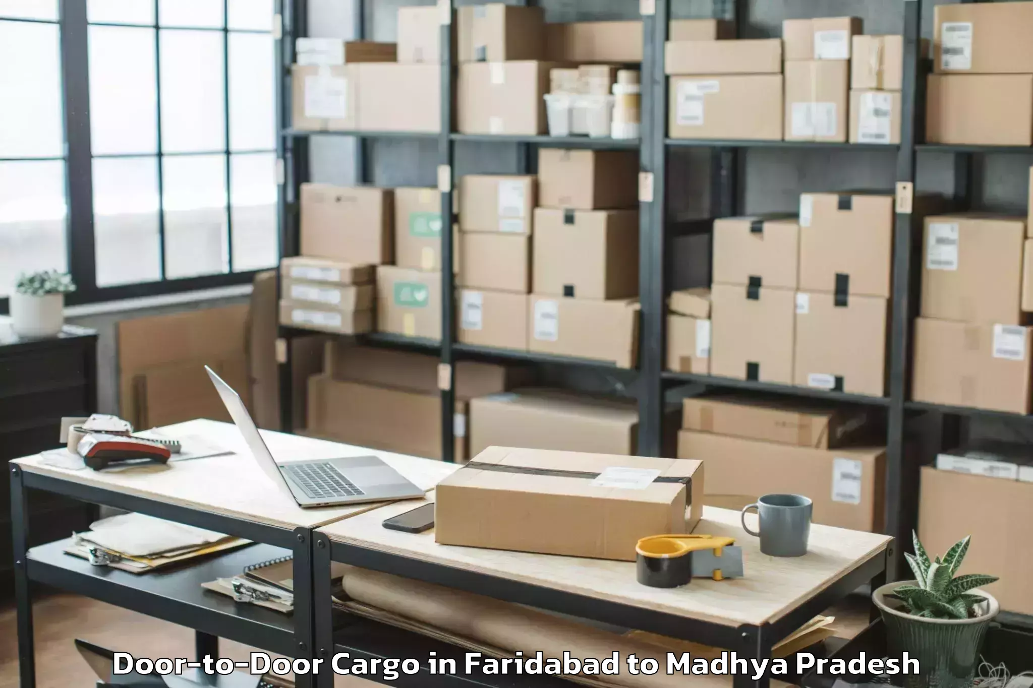 Quality Faridabad to Indore Airport Idr Door To Door Cargo